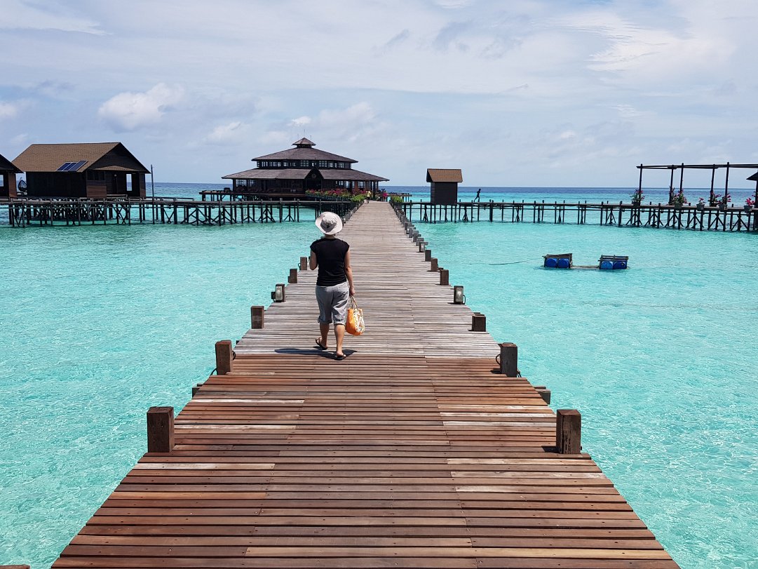Lankayan Island Resort Paradise Island in the Sulu seas. The resort's main building (reception, dining, lounge) was built over the water....