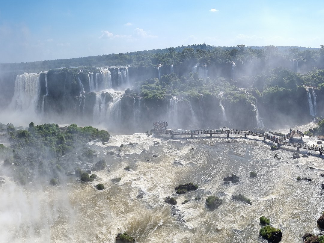 Parque Nacional do Iguacu, Brazil Crossing the border to explore the Iguazu falls from the Brazil side. Standing on the platform facing Devi's throat is a...